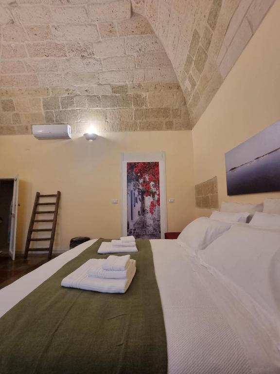Postel nebo postele na pokoji v ubytování LA VOLTA