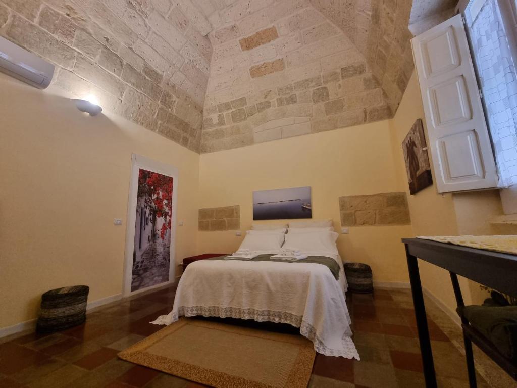 Postel nebo postele na pokoji v ubytování LA VOLTA