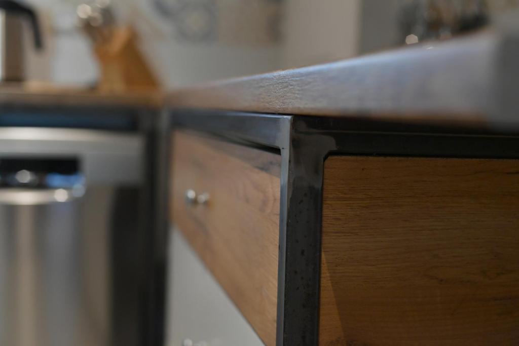 Kuchyň nebo kuchyňský kout v ubytování APARTMAN Tradicia