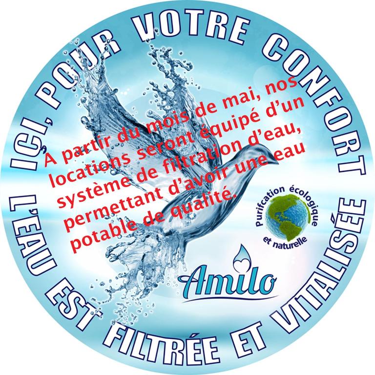 a sticker with the words america voice council and a wave at Gite le colibri Bungalow Azur avec réserve d&#39;eau in Saint-François