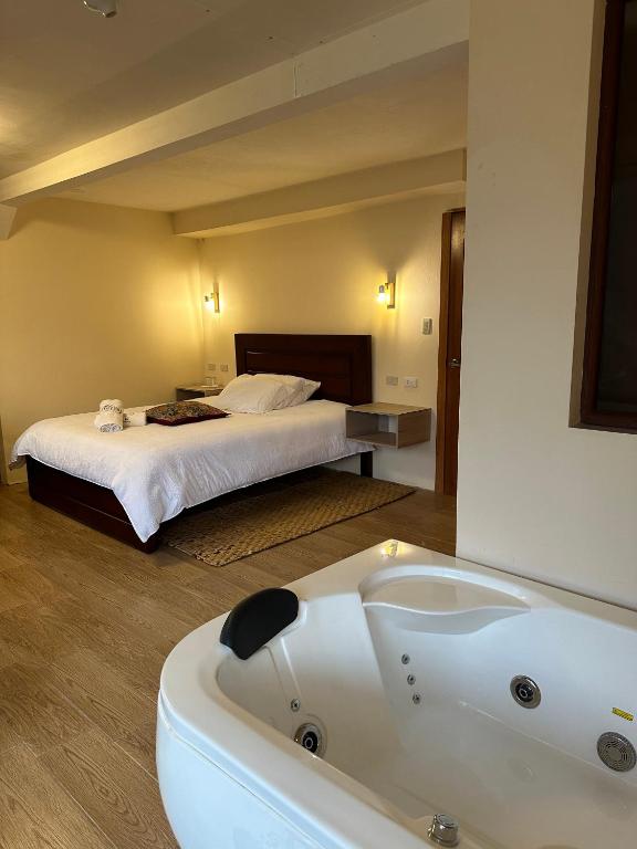 Postel nebo postele na pokoji v ubytování Spa Hotel Etelvina