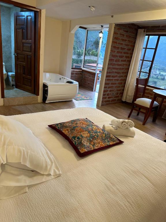 Postel nebo postele na pokoji v ubytování Spa Hotel Etelvina