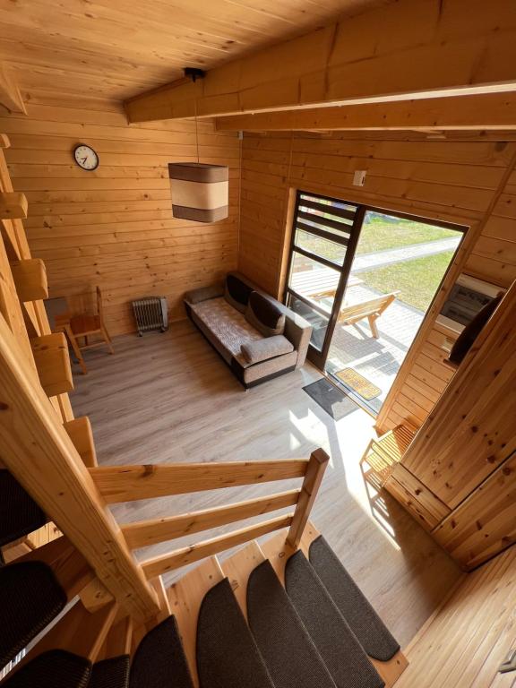 Postel nebo postele na pokoji v ubytování Domki letniskowe Gala