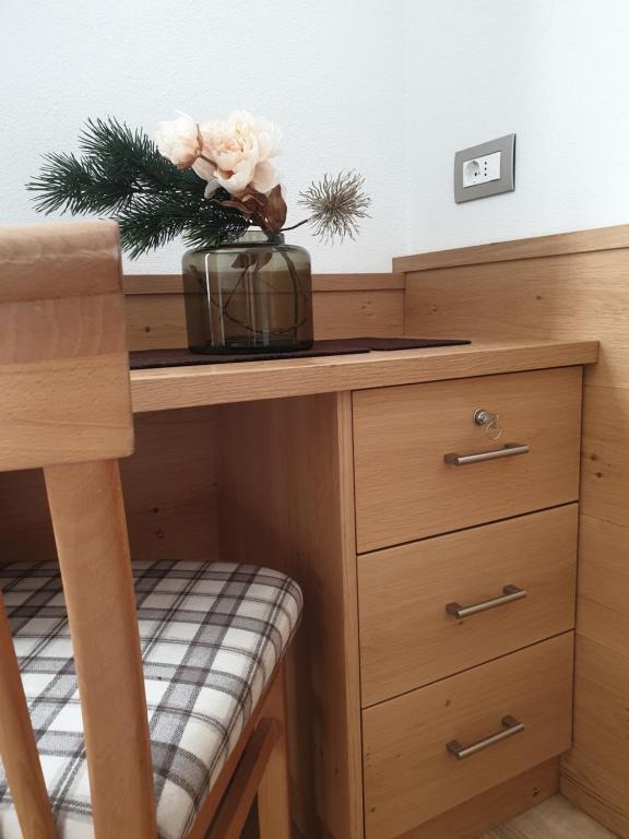 Postel nebo postele na pokoji v ubytování Garni Le Chalet