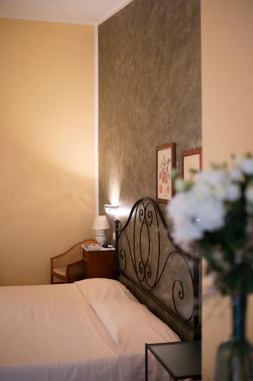 Postel nebo postele na pokoji v ubytování Antico Casale Di Scansano Resort