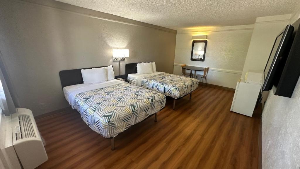 Postel nebo postele na pokoji v ubytování Motel 6-Beaumont, TX