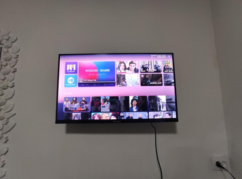 TV a/nebo společenská místnost v ubytování Ortachala Summer House