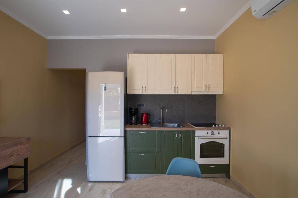 Kuchyň nebo kuchyňský kout v ubytování ELEGANCE SUITES