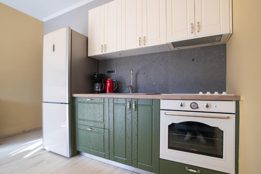 Kuchyň nebo kuchyňský kout v ubytování ELEGANCE SUITES