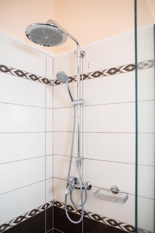 Koupelna v ubytování ELEGANCE SUITES