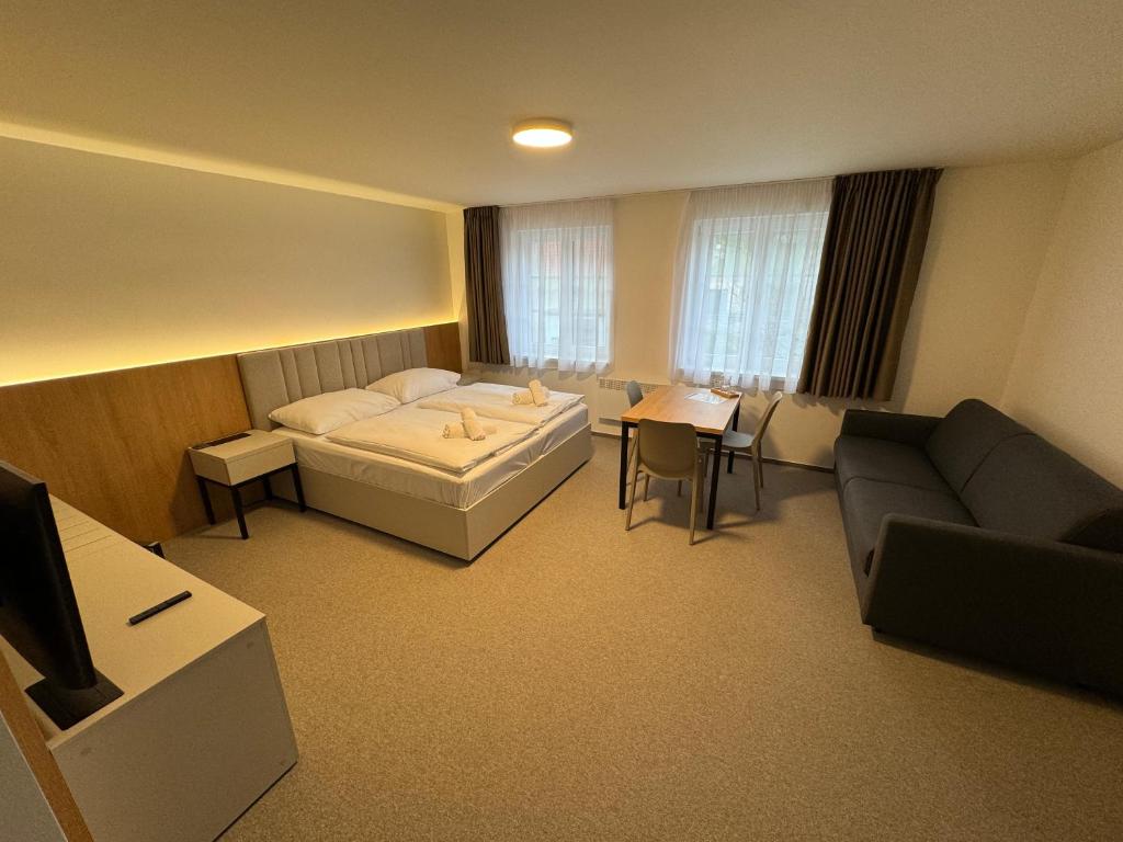 Postel nebo postele na pokoji v ubytování Comfort Pálava, Penzion Klentnice - Mikulov - Pálava