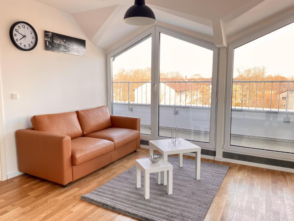 Posezení v ubytování Schönes Erwachen im Frankfurter Penthouse