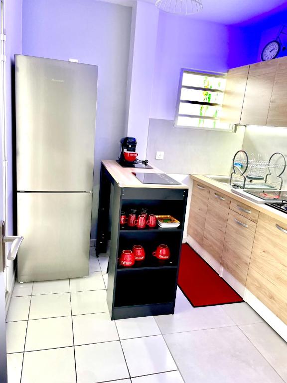 Kuchyň nebo kuchyňský kout v ubytování Appartement de la Mer et du Levant