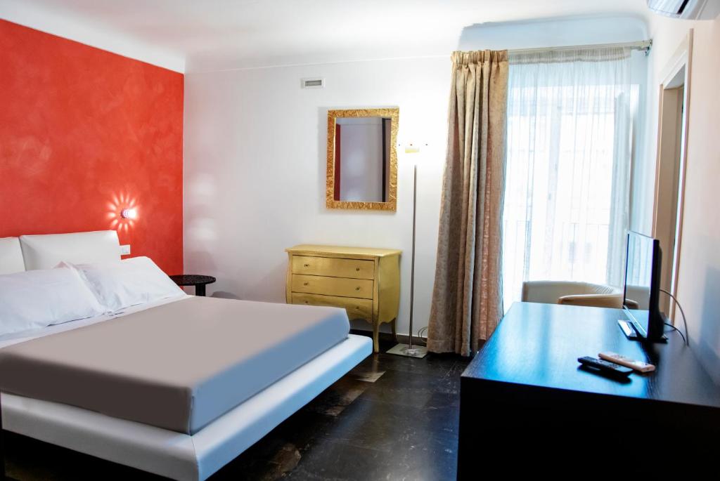 Postel nebo postele na pokoji v ubytování Le Sirene B&B