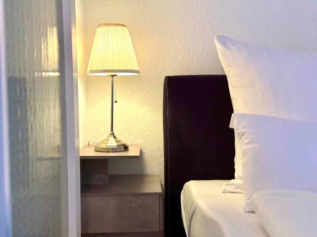 Ein Bett oder Betten in einem Zimmer der Unterkunft Boutique Apartment • Zentrum • Netflix • Parkplatz