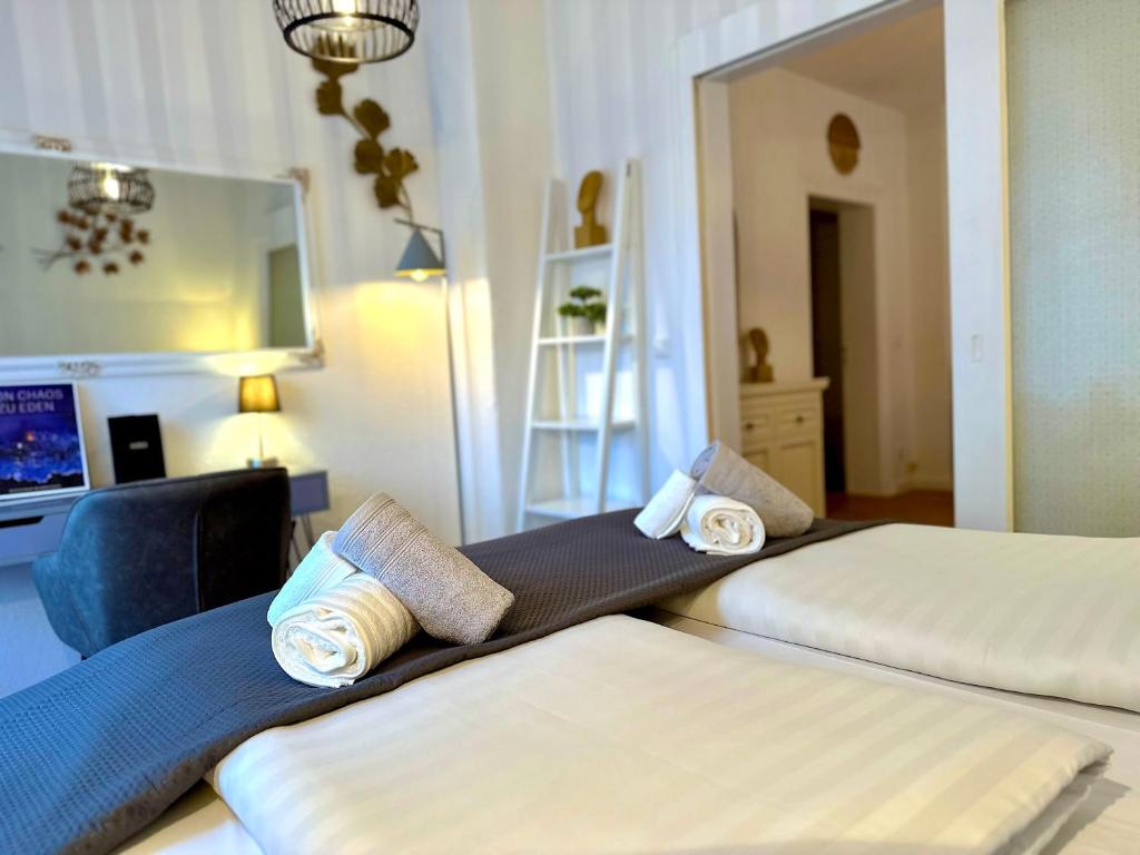 Ein Bett oder Betten in einem Zimmer der Unterkunft Boutique Apartment • Zentrum • Netflix • Parkplatz