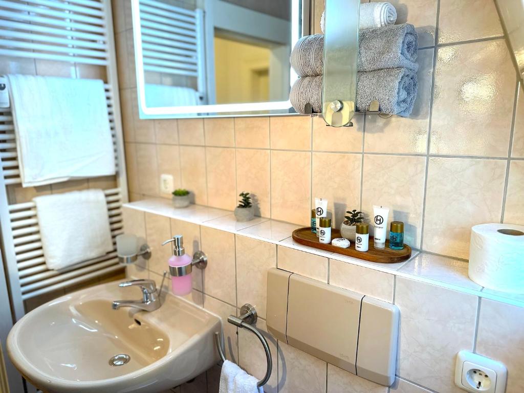 Ein Badezimmer in der Unterkunft Boutique Apartment • Zentrum • Netflix • Parkplatz