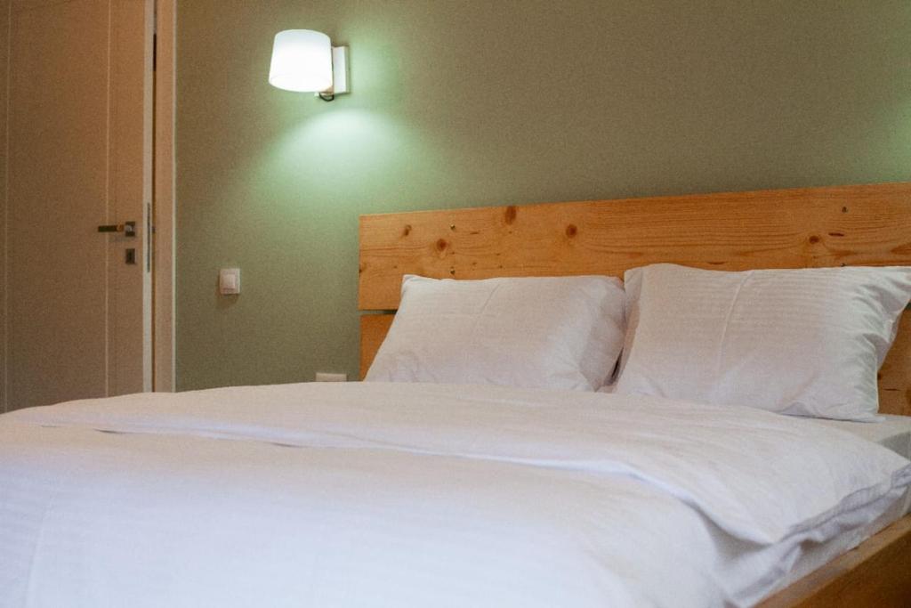 Postel nebo postele na pokoji v ubytování Vila Nikol