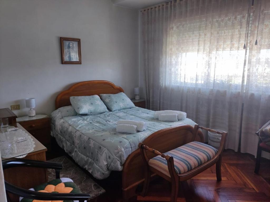 A bed or beds in a room at Casa Jesús