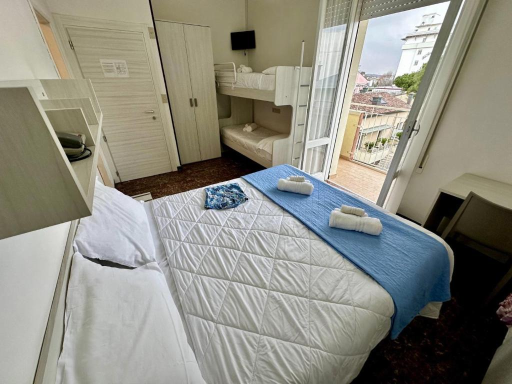 Posteľ alebo postele v izbe v ubytovaní Hotel Napoleon Leisure and Relax