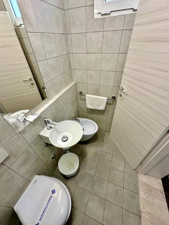 Koupelna v ubytování Hotel Napoleon