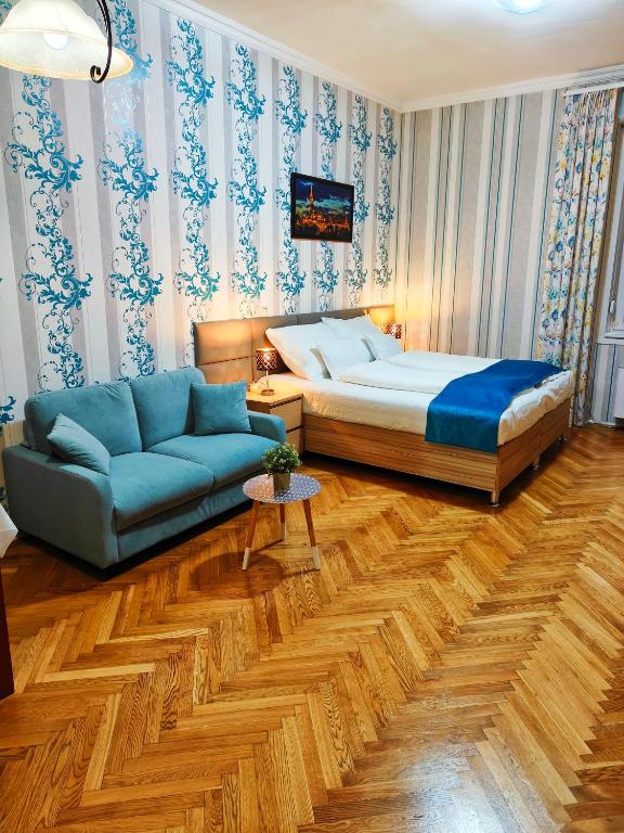 Posteľ alebo postele v izbe v ubytovaní King Apartment