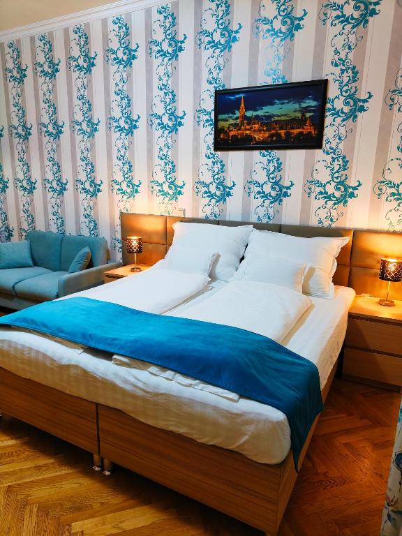 Posteľ alebo postele v izbe v ubytovaní King Apartment