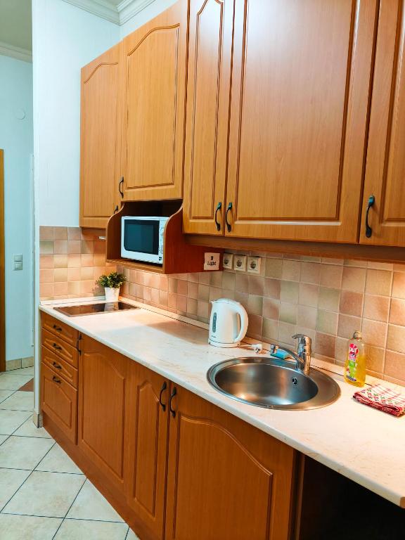 Kuchyňa alebo kuchynka v ubytovaní King Apartment
