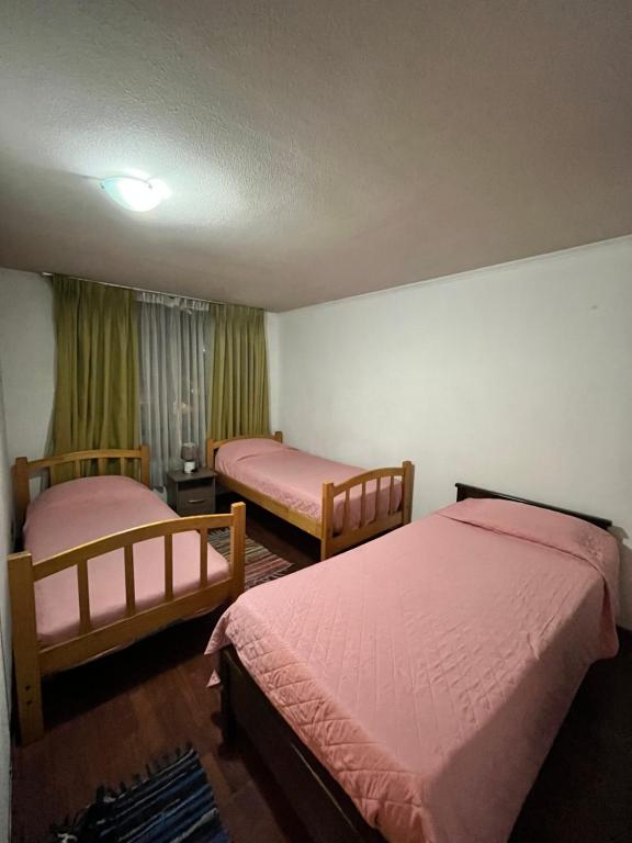 Un pat sau paturi într-o cameră la Departamento Amoblado Full Equipado