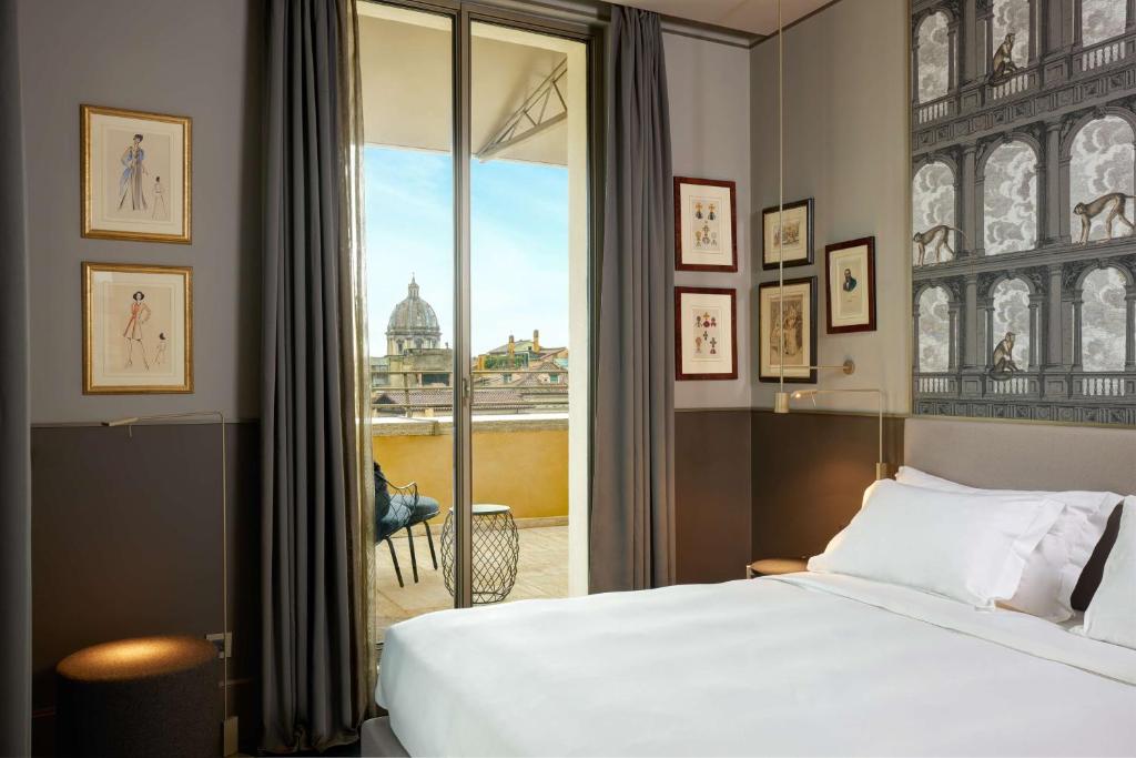 Postel nebo postele na pokoji v ubytování Radisson Collection Hotel, Roma Antica