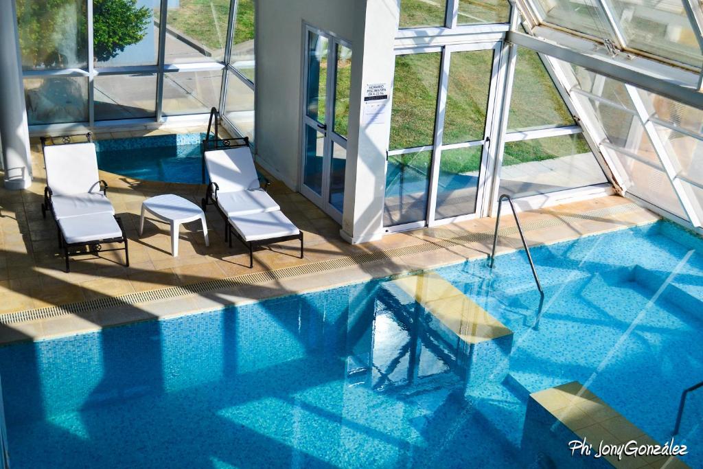 Bazén v ubytování Hotel Quinto Elemento nebo v jeho okolí