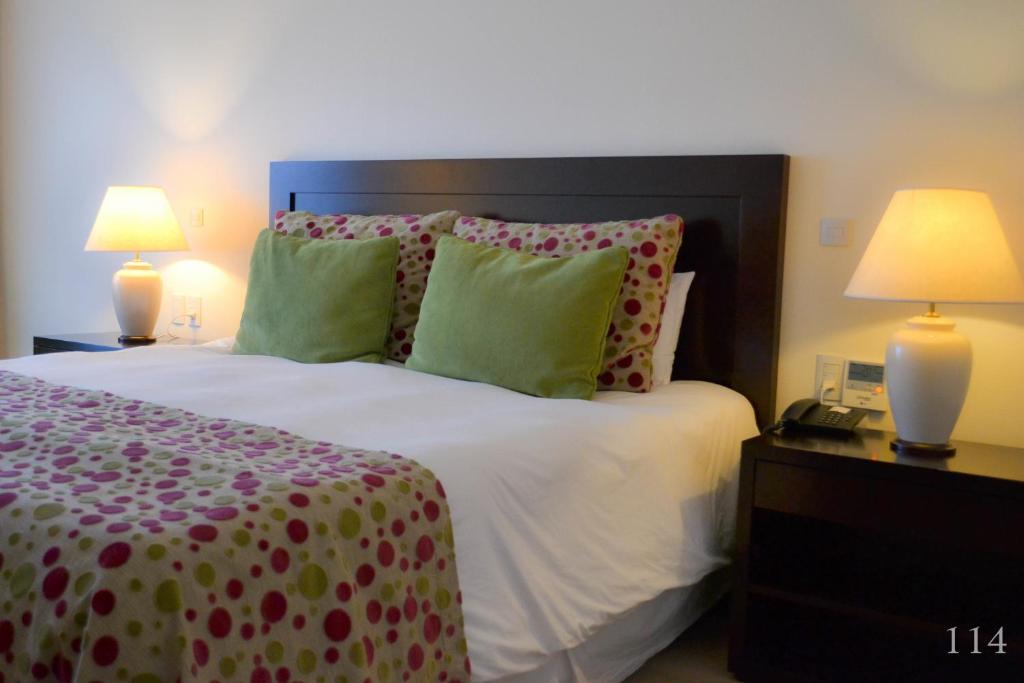 Postel nebo postele na pokoji v ubytování Hotel Quinto Elemento