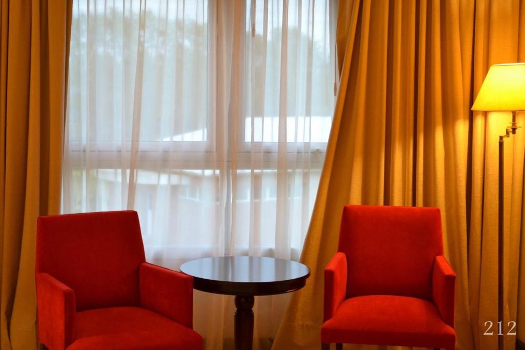 Posezení v ubytování Hotel Quinto Elemento
