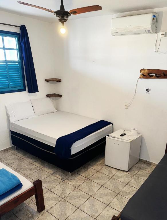 Postel nebo postele na pokoji v ubytování Pousada JK