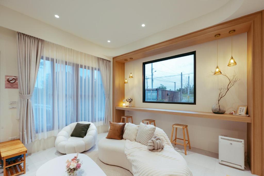 Postel nebo postele na pokoji v ubytování 參穗 SunSui B&B