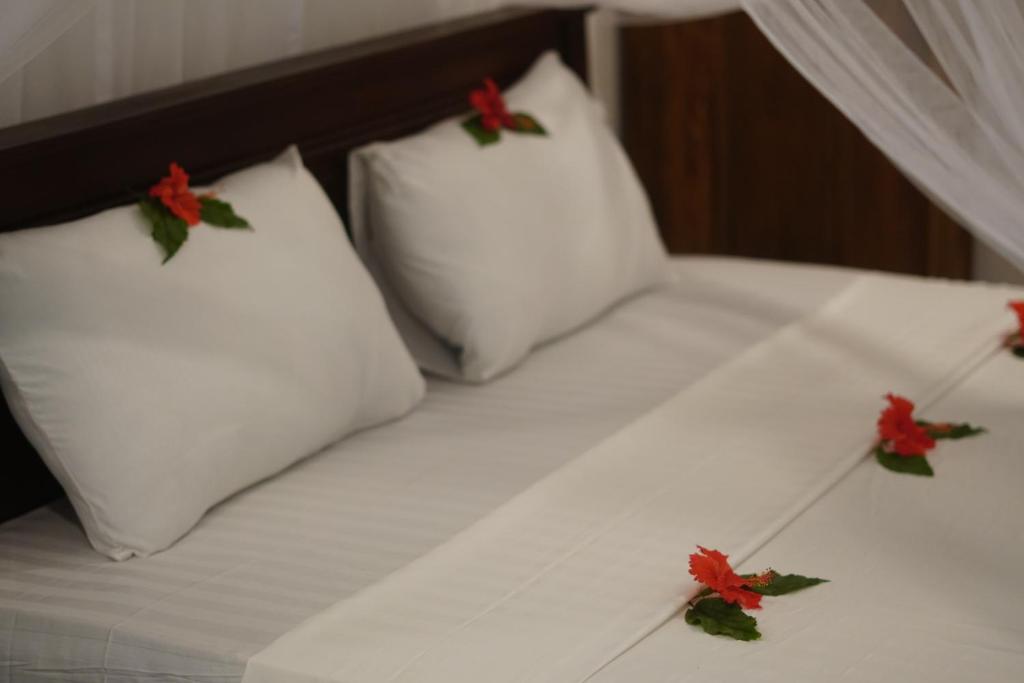 Postel nebo postele na pokoji v ubytování Turtle Bay Beach Resort