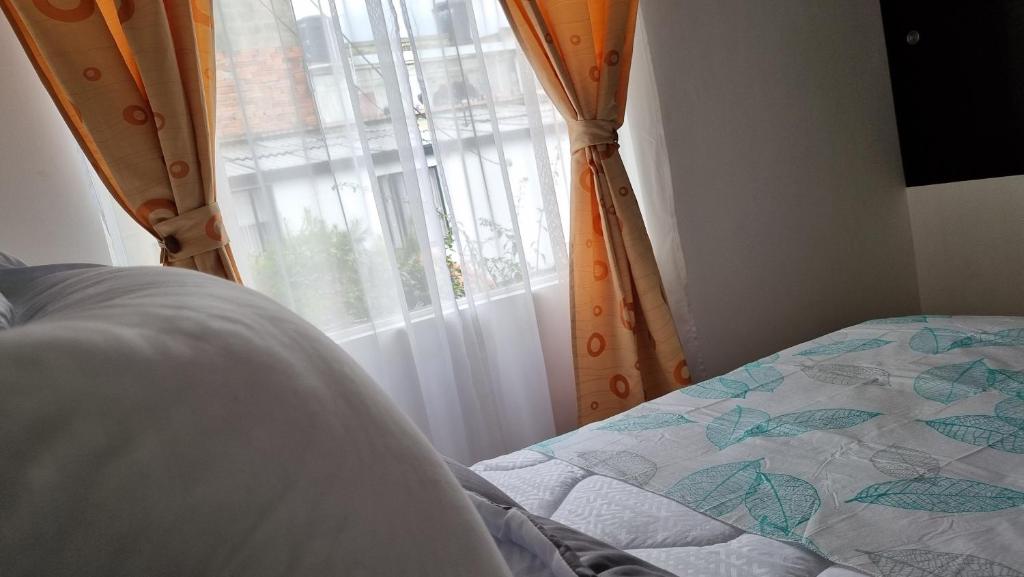 Postel nebo postele na pokoji v ubytování Casa Dohko