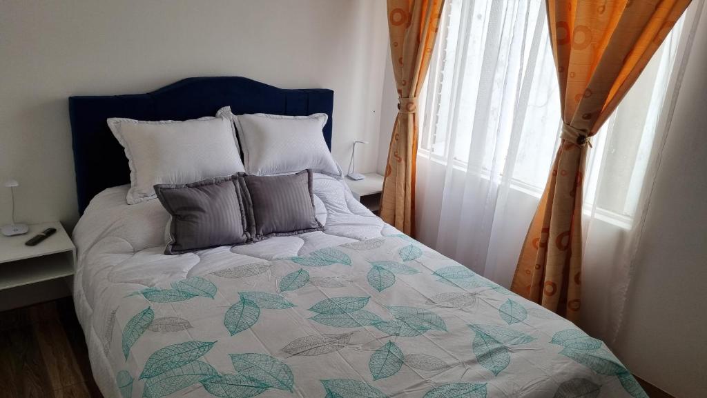 Postel nebo postele na pokoji v ubytování Casa Dohko