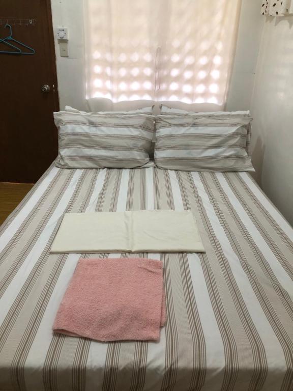 Postel nebo postele na pokoji v ubytování MIOKI HOMETEL