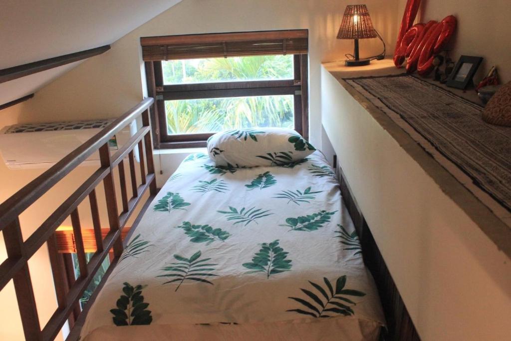 Postel nebo postele na pokoji v ubytování An Villa boutique resort