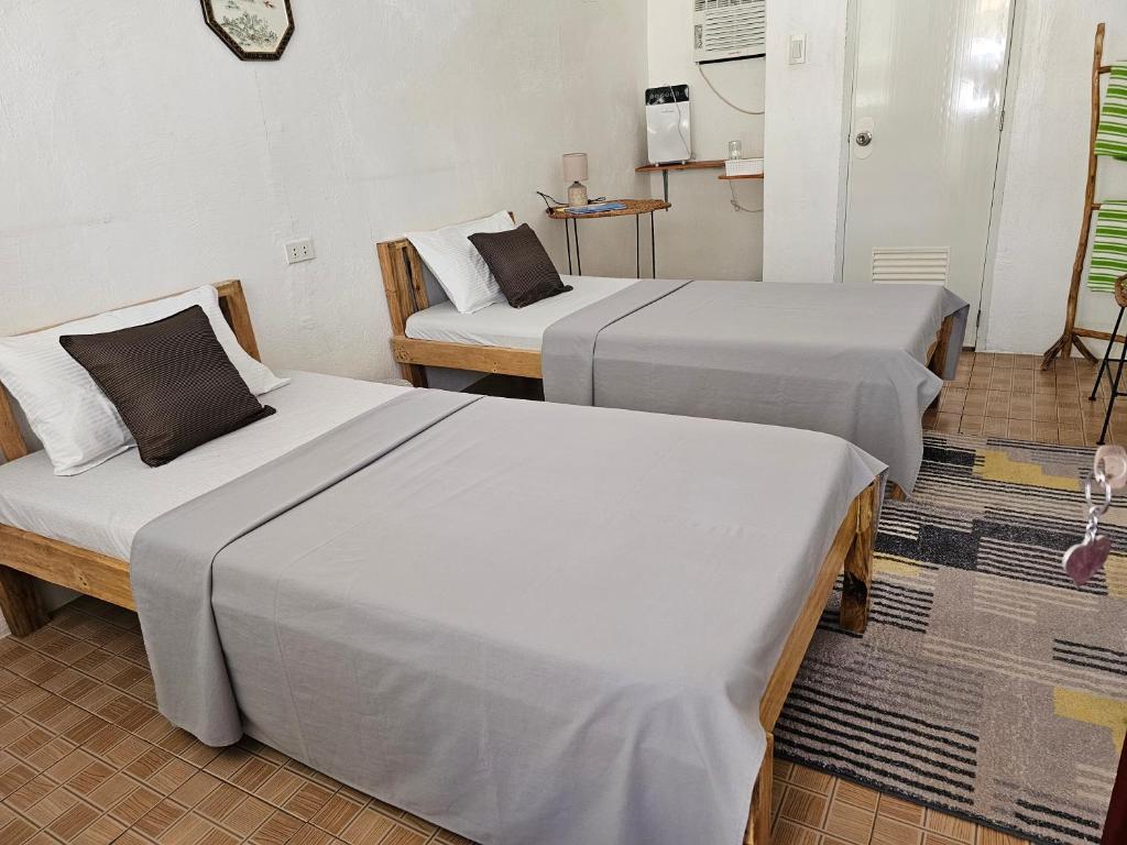 Postel nebo postele na pokoji v ubytování D & N LODGE