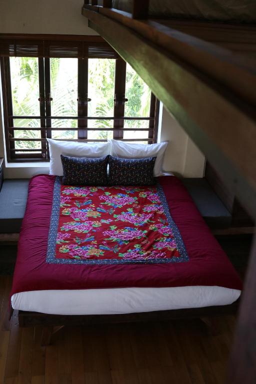 Postel nebo postele na pokoji v ubytování An Villa boutique resort