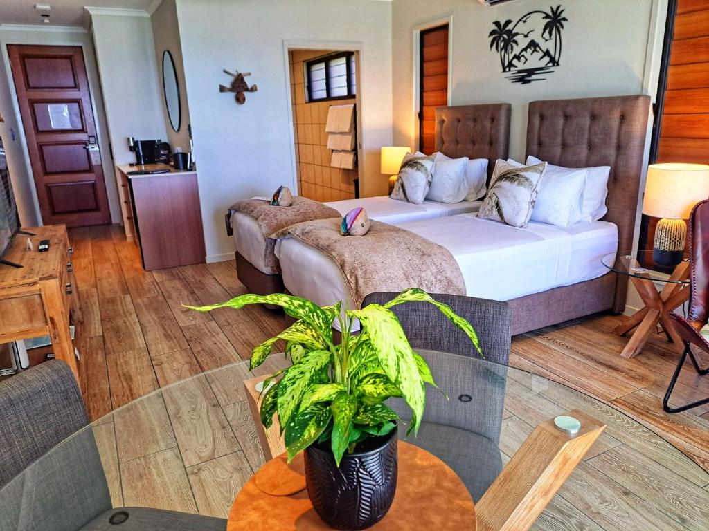 Postel nebo postele na pokoji v ubytování Seadreams Mission Beach