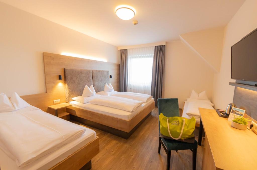 Voodi või voodid majutusasutuse Urdlwirt - Hotel & Restaurant toas