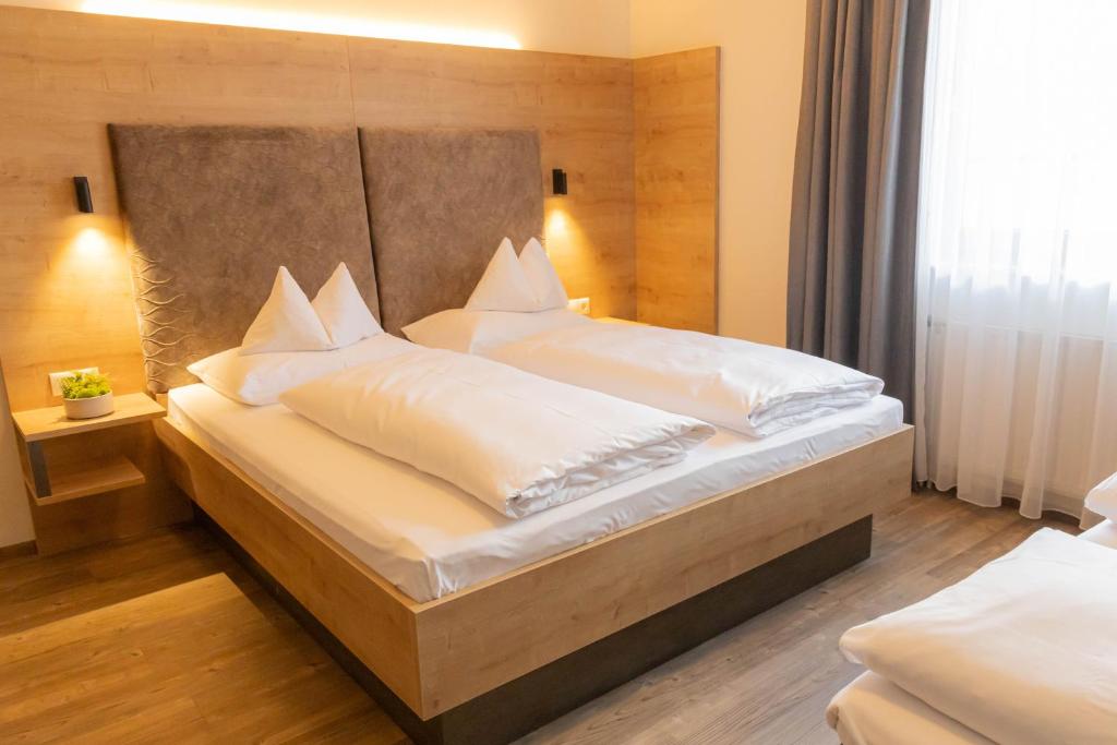 Voodi või voodid majutusasutuse Urdlwirt - Hotel & Restaurant toas