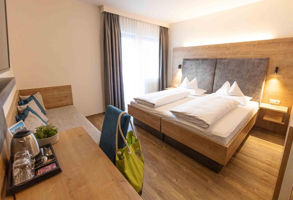 Voodi või voodid majutusasutuse Urdlwirt - Hotel & Restaurant toas