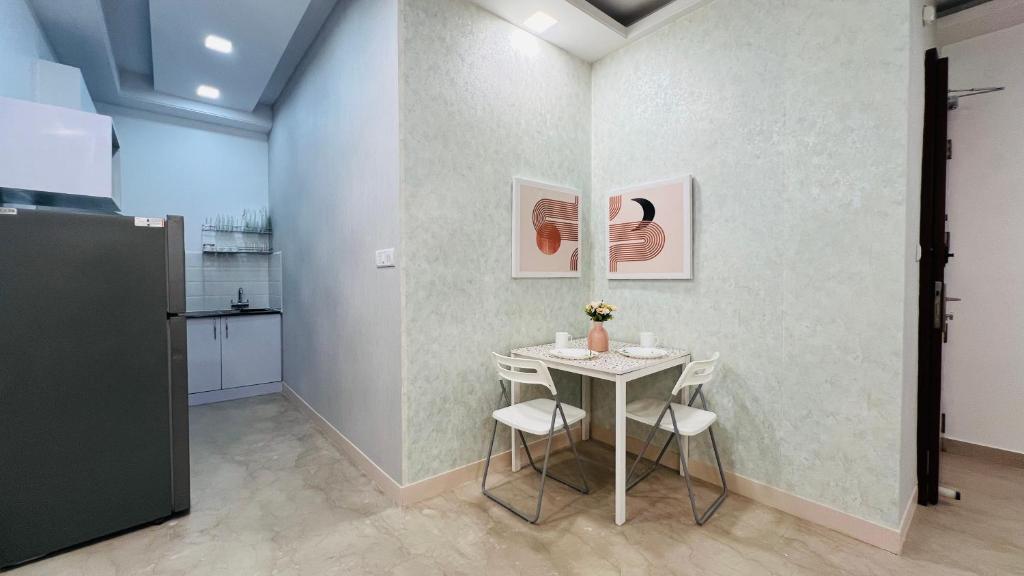 Kuchyň nebo kuchyňský kout v ubytování Olive Serviced Apartments - Central Delhi