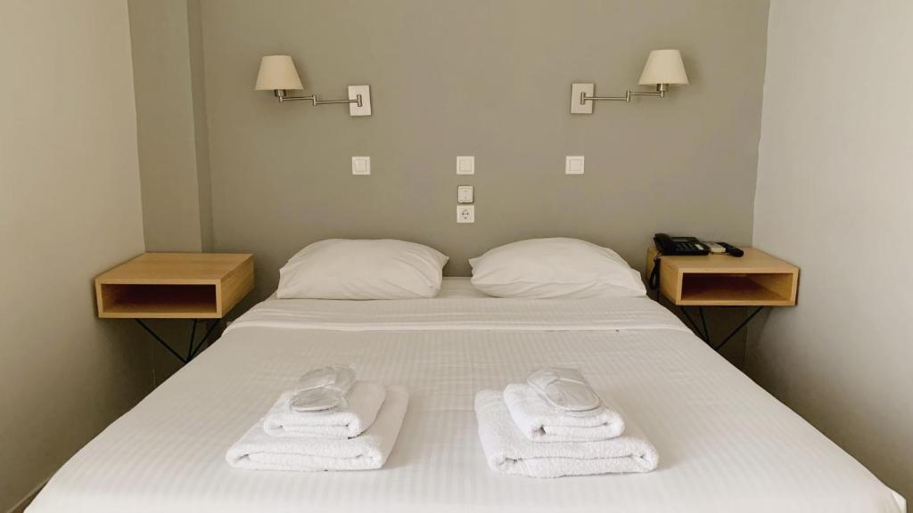 Posteľ alebo postele v izbe v ubytovaní Messini Hotel