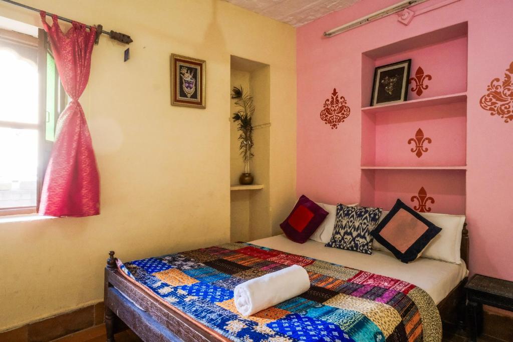 Postel nebo postele na pokoji v ubytování Sagar Guest House