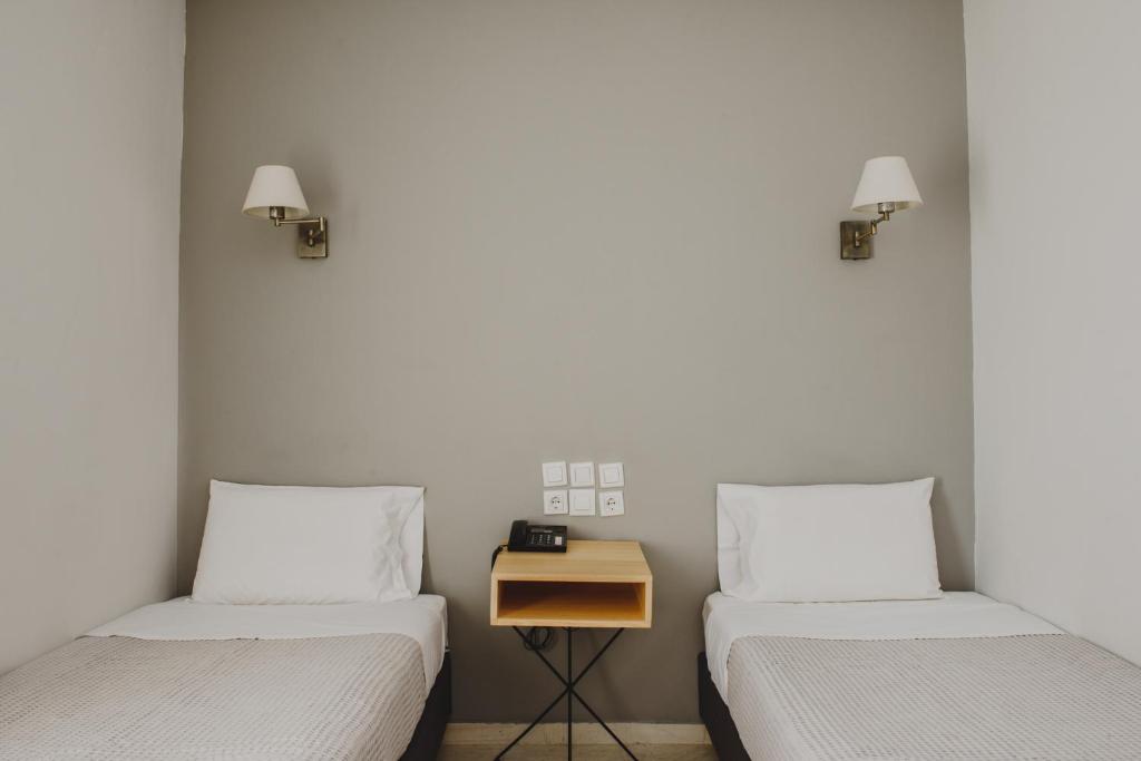 Posteľ alebo postele v izbe v ubytovaní Messini Hotel